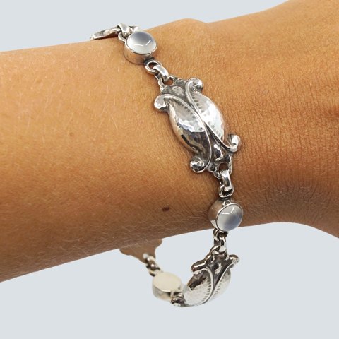 Georg Jensen; A "Moonlight Blossom" bracelet of sterling silver, set with 
moonstone, No. 11 Georg Jensen; A "Moonlight Blossom" bracelet of sterling silver, set with 
moonstone, No. 11